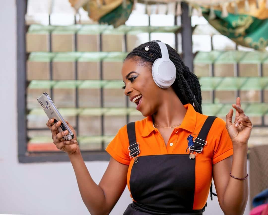 Radio studio and headphones representing Ghana radio listening