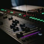Audio engineer's mixing console in a radio studio