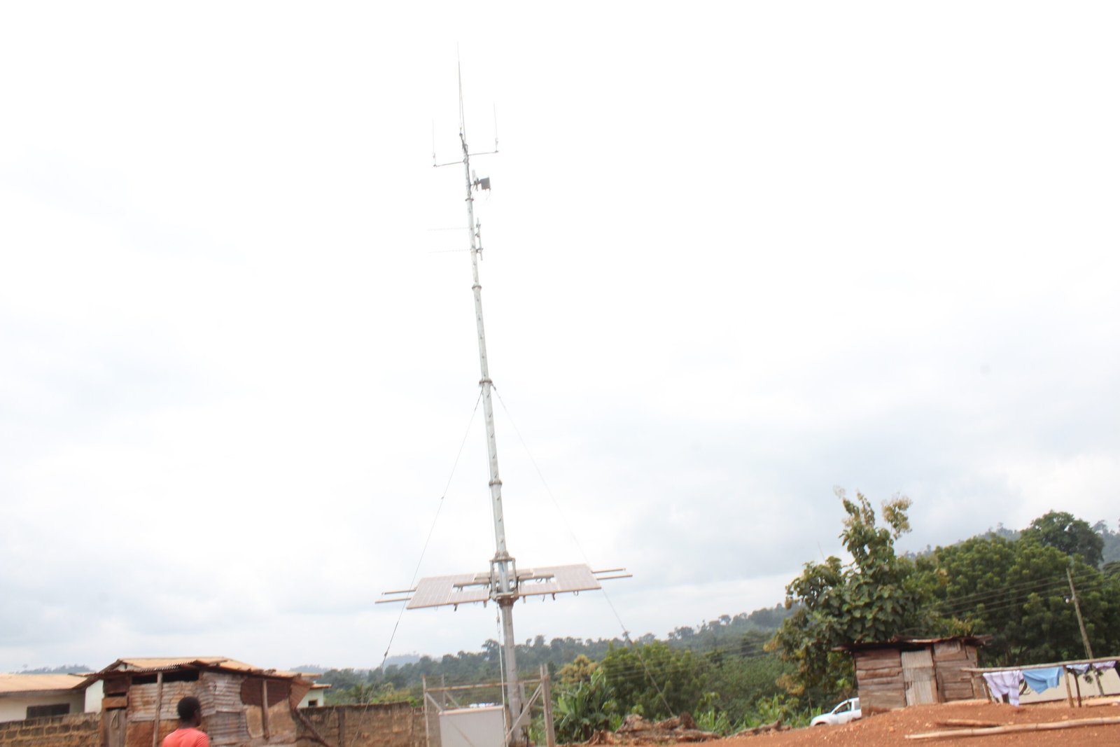 Rural telephony mast in Koikrom, Asante Akim South, illustrating infrastructure needed for mobile voice and data coverage